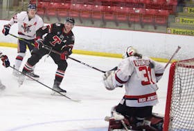Truro Bearcats forward Landon Miron, second from left, rings a shot off the iron in Game 2 of their Maritime Junior Hockey League playoff series with the Valley Wildcats March 20 in Berwick.