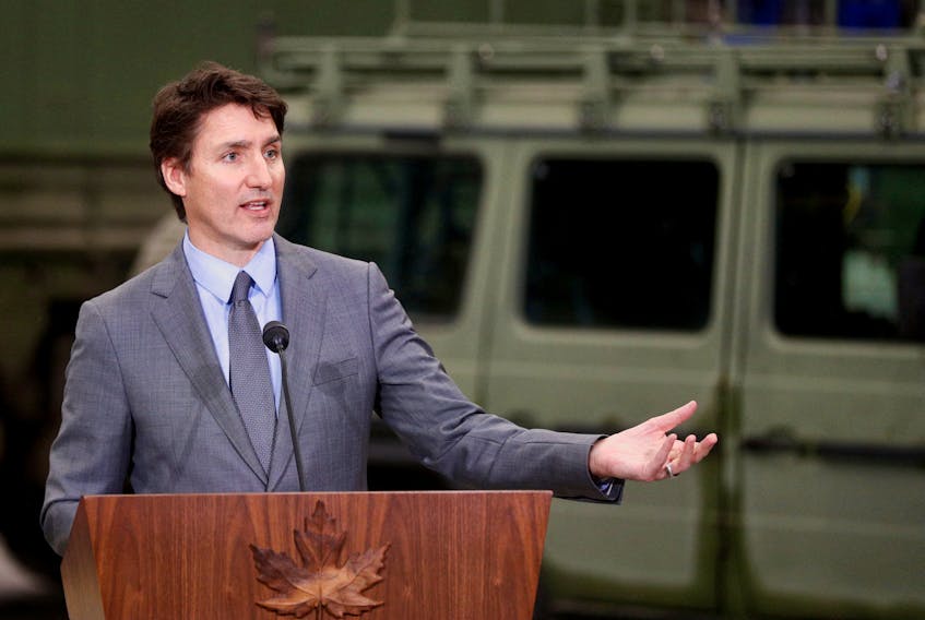 Prime Minister Justin Trudeau, pictured during a March 7 press conference at Canadian Forces Base (CFB) Kingston, has appointed a veteran former official to investigate alleged election interference from other countries. REUTERS/Lars Hagberg