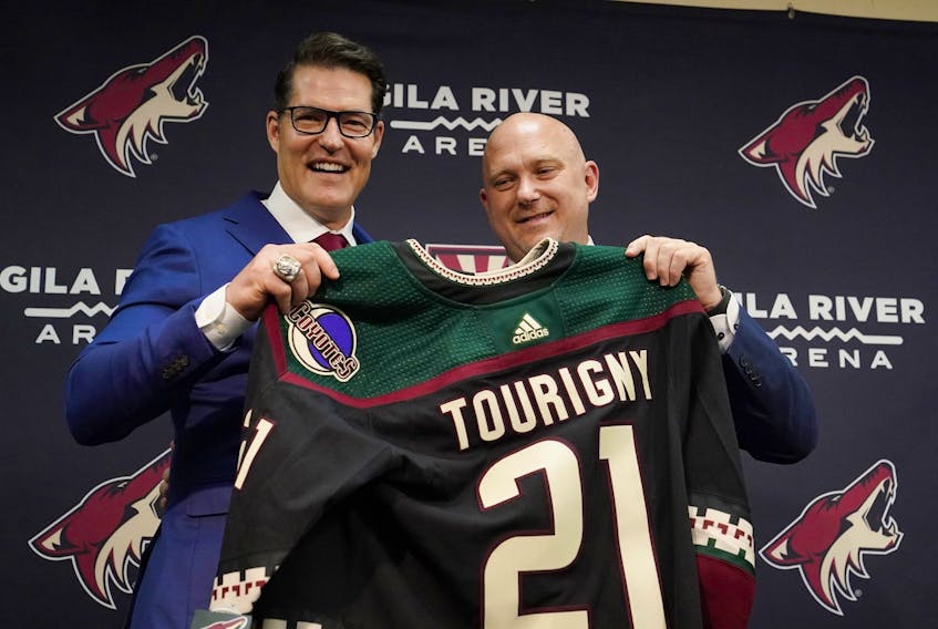 Arizona Coyotes GM Bill Armstrong (left) poses with new head coach Andre Tourigny back in 2021.