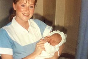 Kelly MacPherson holds Greg Deveau days after he was born at at St. Rita's Hospital in Sydney. Now 33, Deveau always wondered who the nurse in the photo and thanks to a social media post discovered her identity last week.