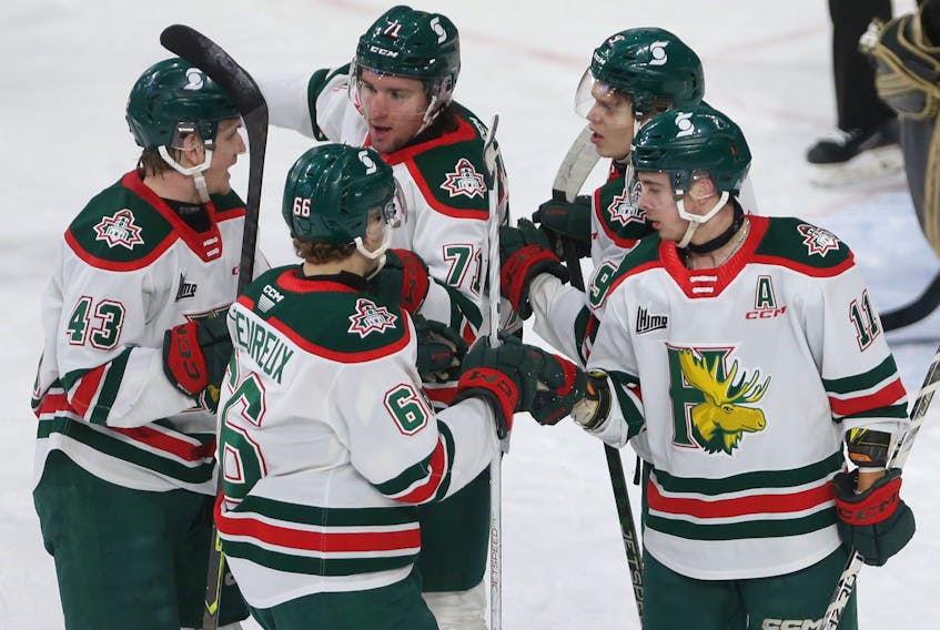 Halifax Mooseheads Jordan Dumais, right, is seen with teammates celebrating teammate Atilio Biasca’s goal against the Charlottetown Islanders during first period QMJHL action in Halifax Wednesday March 23, 2023. He went on to record 2 goals and 5 assists.

TIM KROCHAK PHOTO