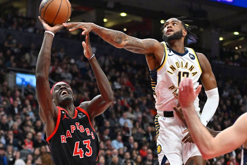 Toronto Raptors forward Pascal Siakam (43) shoots the ball as Indiana Pacers forward Oshae Brissett (12) defends in the second  half at Scotiabank Arena.
