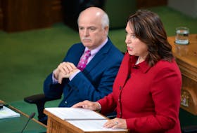N.L. Minister of Finance Siobhan Coady delivers the budget speech in the House of Assembly at Confederation Building in St. John's on Thursday, March 23, 2033. At left is Health Minister Tom Osborne.