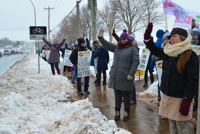 Members of the UPEI Faculty Association host a strike rally at the main entrance of the university in Charlottetown on March 24. Representatives from faculty associations in Manitoba, Saskatchewan, Ontario and the Maritimes were also there in support. Dave Stewart • The Guardian