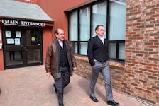 Lawyers Duncan Boswell, left, and John Wilson, leave the provincial courthouse in Charlottetown on March 23. On that date, Boswell and Wilson represented the P.E.I. Potato Board in Federal Court regarding the federal government's 2021 decision to ban seed potato exports to the U.S. and within Canada as a result of the presence of potato wart.  TERRENCE MCEACHERN - THE GUARDIAN