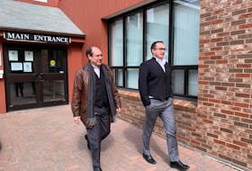 Lawyers Duncan Boswell, left, and John Wilson, leave the provincial courthouse in Charlottetown on March 23. On that date, Boswell and Wilson represented the P.E.I. Potato Board in Federal Court regarding the federal government's 2021 decision to ban seed potato exports to the U.S. and within Canada as a result of the presence of potato wart.  TERRENCE MCEACHERN - THE GUARDIAN