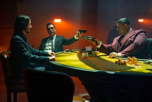 Poker faces: From left, Keanu Reeves, Donnie Yen and Scott Adkins in John Wick: Chapter 4.