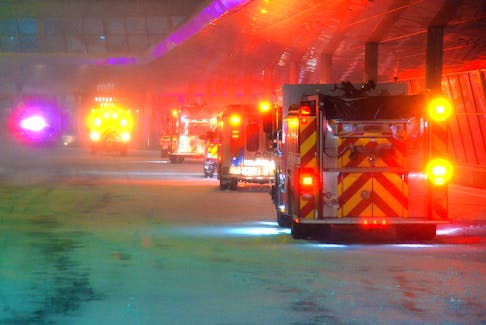Firefighters were called in when a fire broke out at St. John's International Airport at the height of a snow storm late Friday night. Keith Gosse/The Telegram