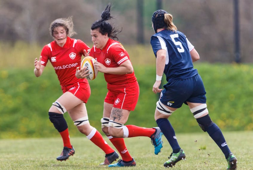Scotsburn's Emma Taylor (middle) is in Spain with Canada's women's rugby squad. The national team played South Africa in a test match on Saturday afternoon. - RUGBY CANADA