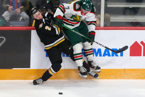 Halifax Mooseheads David Moravec and Cape Breton Eagles   Cam Squires, left, collide during QMJHL action in Halifax Friday March 24, 2023.

TIM KROCHAK PHOTO