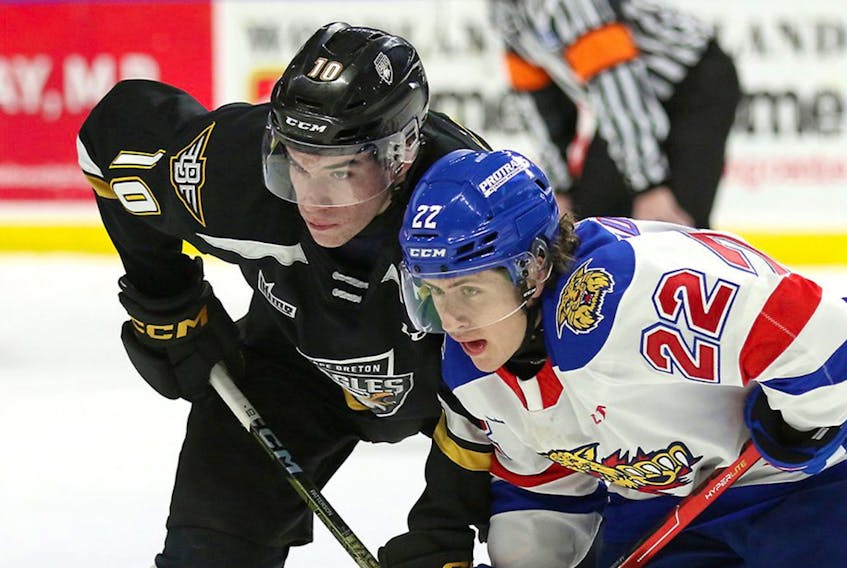 Cape Breton Eagles' Luke Patterson looks to fend off Wildcats' Thomas Auger during their final 2022-23 QMJHL regular season game Saturday afternoon at the Avenir Centre in Moncton. The Eagles lost 9-2 to the Wildcats. CONTRIBUTED/MIKE SULLIVAN