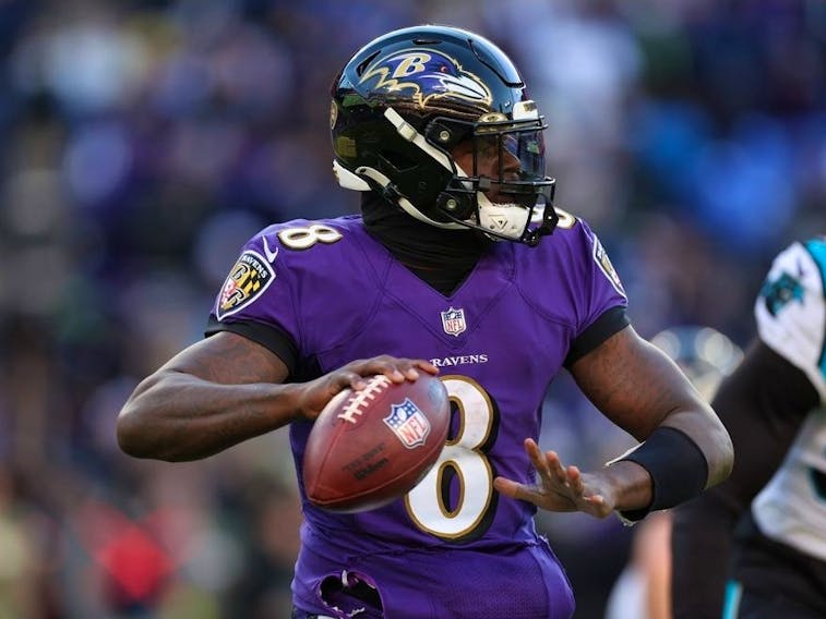 Lamar Jackson should take the money and run (and throw)
