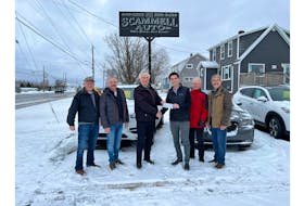 To celebrate 20 years in business, Scammell Auto Limited is donating a portion of each car sale to a different local charity every month this year. In January, they donated $2,800 to the Knights of Columbus to support people with special medical treatments not covered by MSI. PHOTO CREDIT: Scammell Auto Limited.