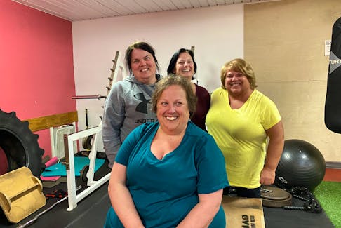 For the past few months, a group of women from Tignish have been hitting up the Iron Haven Gym in Alberton to help encourage their friend, Jennifer MacKinnon, who lost her sight in early 2020.  From back left are Cheryl Hackett, Kim DesRoches, Mona Jeffery and MacKinnon, front. – Kristin Gardiner/SaltWire Network