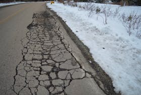 Port Morien, Donkin and area resident have seen an increase in deteriorating pavement along Long Beach Road in Port Morien, along a route used for coal transport from nearby Donkin Mine. IAN NATHANSON/CAPE BRETON POST