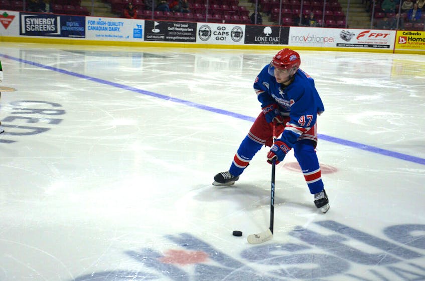 Summerside D. Alex MacDonald Ford Western Capitals defenceman Ed McNeill prepares to pass the puck during a recent Maritime Junior Hockey League (MHL) game at the Island Petroleum Energy Centre in Summerside. McNeill was named the MHL’s defenceman of the year on March 23.