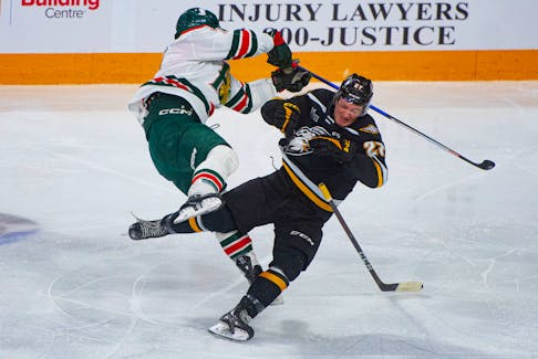 Halifax Mooseheads left winger Evan Boucher runs over Cape Breton Eagles centre Cameron Henderson during the first period of QMJHL action at the Scotiabank Centre on Sunday, Jan. 8, 2023.
Ryan Taplin - The Chronicle Herald