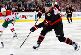 Ottawa Senators left wing Brady Tkachuk shoots the puck against the New Jersey Devils during the first period of an NHL hockey game, Saturday, March 25, 2023, in Newark, N.J.