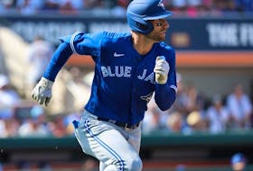 Mar 4, 2023; Lakeland, Florida, USA;  Toronto Blue Jays outfielder Kevin Kiermaier hits a 2 RBI triple during the fourth inning against the Detroit Tigers at Publix Field at Joker Marchant Stadium.  
