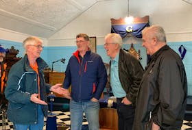 Jeff Gregory (from left), treasurer for Barrington Ground Search & Rescue, shares a laugh with members of the Masonic Philadelphia Lodge #47 in Barrington Passage, Timmy Adams, Norm Perry and King Perry during a cheque presentation on March 22 where the lodge donated $5,000 to BGS&Rwho are fundraising to buy a new vehicle. KATHY JOHNSON