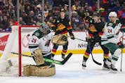  Minnesota Wild goalie Marc-Andre Fleury allows a goal to Vancouver Canucks’ Brock Boeser, not seen, as Vitali Kravtsov, back centre, Sheldon Dries and Minnesota’s Matt Dumba watch during the first period of an NHL hockey game in Vancouver, on Thursday, March 2, 2023.