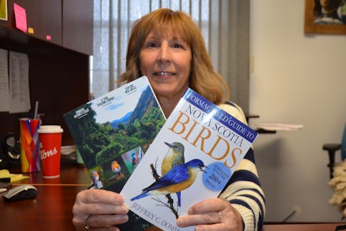 Lisa Fenton has bird books available for people to borrow as part of Bird Watch Bingo, a new loan program that aims to get people outdoors and active. It’s free of charge and you win a prize if you take part.