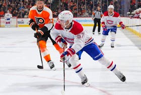 Canadiens' Sean Farrell controls the puck against Flyers' Kevin Hayes Tuesday night in Philadelphia.