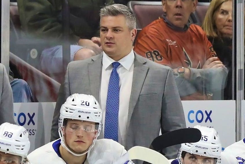 Sheldon Keefe behind the bench of the Maple Leafs against the Coyotes at Mullett Arena in Tempe, Ariz., Dec. 29, 2022.