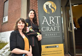 Rebecca Hill (front) and Rachel Hill stand beside their signage for Art of the Craft Market, outside the entrance into the Royal Canadian Legion hall, earlier this month. This was the third market they’ve put on but the first at the Legion which they felt was a great location.
