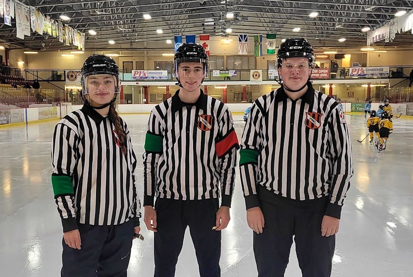 Hockey officials in Newfoundland and Labrador who are under the age of 18 began wearing green arm bands in January as part of a Hockey NL program aimed at curbing the amount of abuse young officials receive. Contributed photo