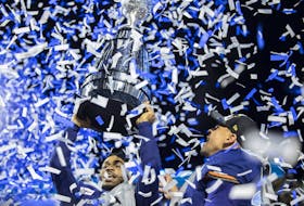 Toronto Argonauts wide receiver Brandon Banks (16) and Toronto Argonauts running back Andrew Harris (33) celebrate after defeating the Winnipeg Blue Bombers  during the 109th Grey Cup at Mosaic Stadium on Sunday, November 20, 2022 in Regina. 