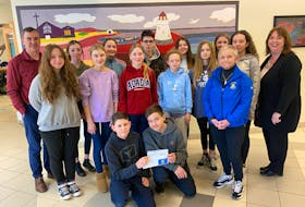 Members of the Builders Club of Riverside are shown with Cape Breton Golden K members. In back, from the left, are Todd MacAulay VP of Riverside, Myla MacKinnon, Julia Brown, Jackson Lahey, Miah MacIsaac, Frances Calabrese, Maggie Dillon, Peyton Moore, and Suzanne Brown, principal of Riverside. In the middle row, from the left, are Janaya Newton, Jacey Beaver, Brenna Hussey, Allie Holland, and Deb Murray, one of the Cape Breton Golden K advisors to the Riverside Builder’s Club. Kneeling in front, from the left are Pius Nolan and Patrick McGuigan. Talon MacPherson was absent when the photo was taken. CONTRIBUTED