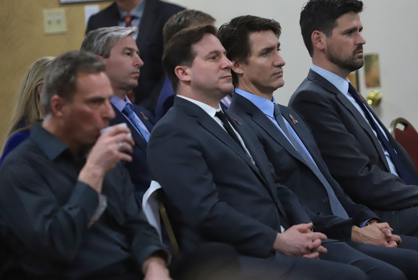 FOR NEWS STORY:
Prime Minister Justin Trudeau, Public Safety Minister Marco Mendiciono, left,  and Immigration, Refugees and Citizenship Minister Sean Fraser, right...and NS Premier Tim Houston look on during the release of the final report of the Mass Casualty Commission in Truro, NS Thursday March 30, 2023.


TIM KROCHAK PHOTO