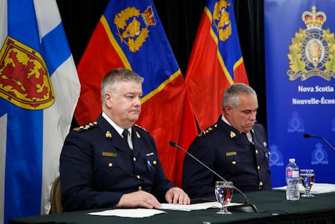 Commanding of the Nova Scotia RCMP Dennis Daley and acting RCMP commissioner Michael Duheme give their statements before taking questions from media following the release of the final report of the Mass Casualty Commission in Truro on Thursday.
