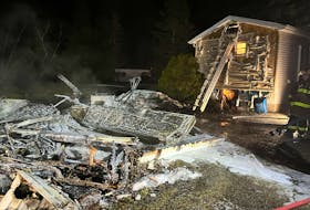 Hants County firefighters battled an evening garage fire at a property in Upper Falmouth on March 18. They saved the nearby house.