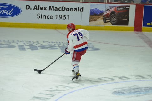 Summerside D. Alex MacDonald Ford Western Capitals forward Marc Richard, 79, carries the puck during Game 5 of a Maritime Junior Hockey League (MHL) playoff series against the Campbellton Tigers at the Island Petroleum Energy Centre in Summerside on March 27. Richard recorded three points and was named the star in the Caps’ 5-4 win in Game 6 in Campbellton, N.B., on March 29. The series is tied 3-3, with Game 7 in Summerside on March 31 at 7 p.m. Jason Simmonds • The Guardian