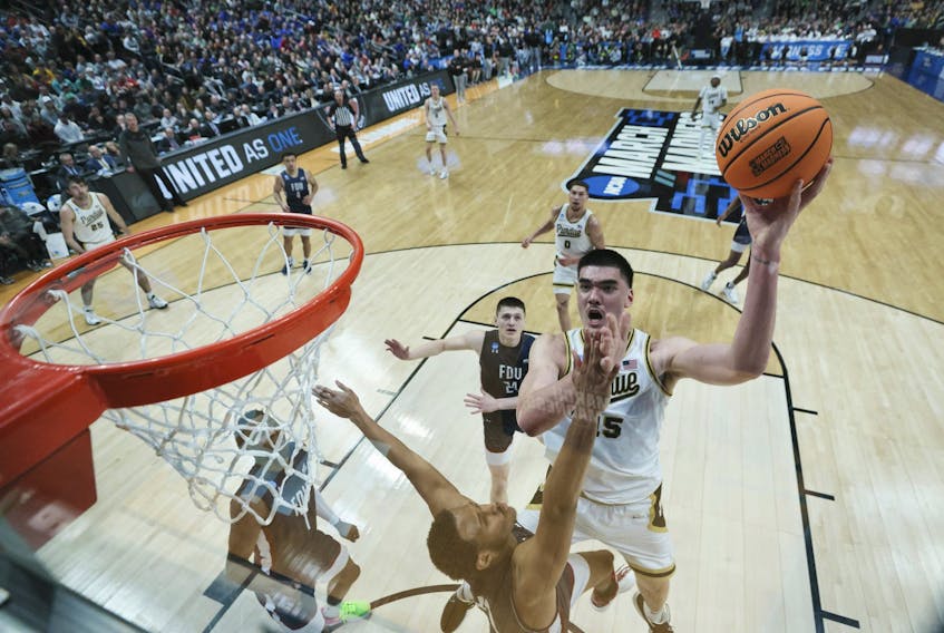 Zach Edey of the Purdue Boilermakers shoots against the Fairleigh Dickinson Knights during the second half in the first round of the NCAA Men's Basketball Tournament.