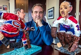Canadiens owner Geoff Molson with statues of Lorne (Gump) Worsley, left, and Jacques Plante by Canadian sculptor Patrick Amiot in his office at the Bell Centre.