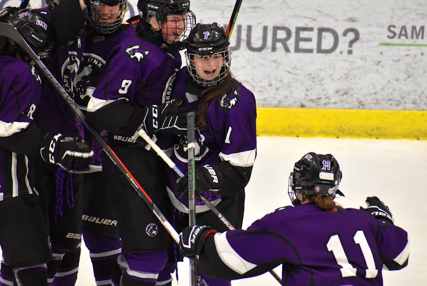 Kennedy Vickers of the Cape Breton Lynx, middle, celebrates with her teammates after scoring a goal during Atlantic Under-18 'AAA' Female Hockey Championship action at the Membertou Sport and Wellness Centre on Thursday. JEREMY FRASER/CAPE BRETON POST.