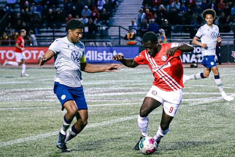 HFX Wanderers midfielder Andre Rampersad (left) defends against Jared Agyemang of Guelph United during a Canadian Championship preliminary match last season in Guelph, Ont. - CLOUD NORTH VISUALS 