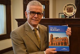 Coun. John McAleer, chair of council’s finance committee, brings down Charlottetown’s operational budget at city hall on March 31. It forecasts spending to rise from $66.6 million in the current fiscal year to $77.5 million in 2023-224. Dave Stewart • The Guardian