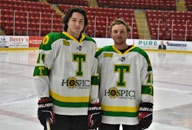 Truro Jr. A Bearcats’ assistant captain Ryan Maynard, a defenceman from Cochrane, Ontario, and second-year forward Andyn Furmidge from Brookfield, sport the special jerseys the Bearcats will wear for their final regular season game March 10, versus Amherst, and that are being auctioned off to support the Colchester East Hants Hospice Society. Richard MacKenzie