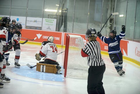 Nova Scotia captain Samantha Morrison, right, celebrates her goal in the Canada Games semifinal with Ontario March 4 in Charlottetown, P.E.I.