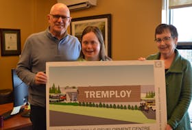 Tremploy Inc. is constructing a new building on Regis Duffy Drive in Charlottetown as volunteer staff work to fundraise money to pay for the project, which ran over budget. Pictured are, from left, Steve Loggie, who is volunteering with the fundraising campaign, his daughter, Rachael, who is a client at Tremploy Inc., and Teresa Hennebery, the volunteer chair of the capital fundraising campaign. Dave Stewart • The Guardian