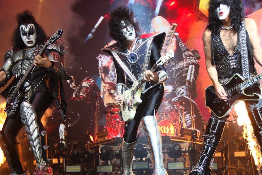  KISS’s Gene Simmons (left), Tommy Thayer (centre) and Paul Stanley (right) perform at the Movistar Arena in Bogota on May 7, 2022. (Photo by Juan Pablo Pino/AFP)