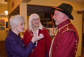 Patsy LeBlanc, left, chats with Christine Igot and Paul Lalonde after the screening of the documentary film In the Footsteps of Dugua de Mons at King's Theatre in Annapolis Royal. King's Theatre donated the use of the building for the evening.