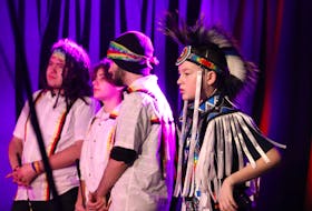 Taite Woolridge, right, a member of Mi’kmaq Heritage Actors, dances at Port Charlottetown for an IllumiNations Festival event on March 2. Woolridge also performed at the Canada Games opening ceremony. - Logan MacLean