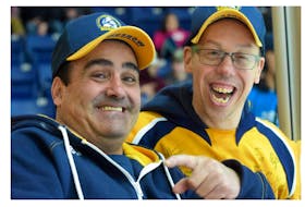 Mark Deveau and Randy 'Rammer' Muise are best friends and also play a big role with the Yarmouth Jr. A Mariners organization. Their friendship and their ability to communicate where words fail them is inspiring to all. And their support for the team is always appreciated. TINA COMEAU PHOTO