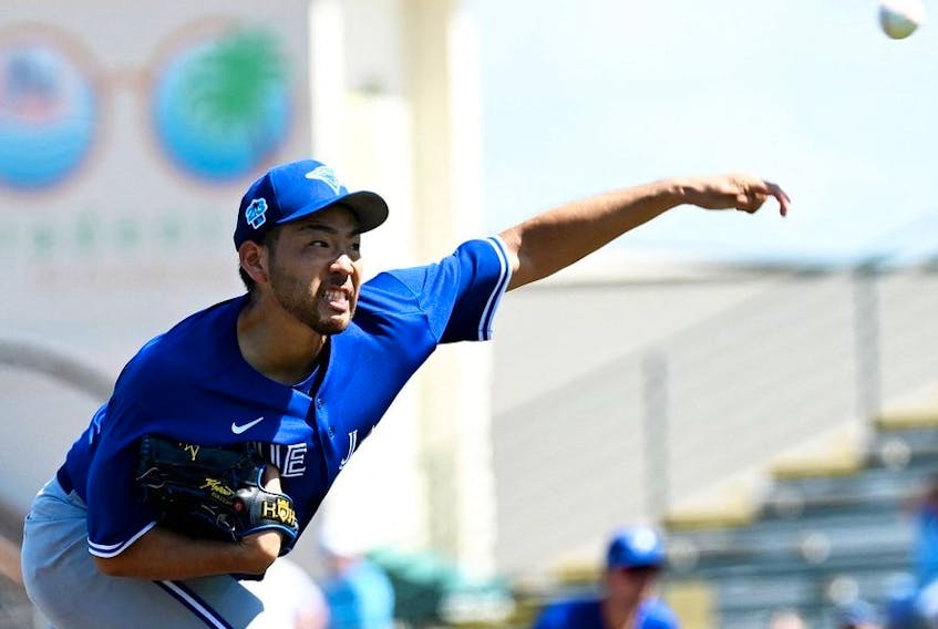 Mar 7, 2023; Bradenton, Florida, USA; Toronto Blue Jays pitcher Yusei Kikuchi throws a pitch in the second inning against the Pittsburgh Pirate at LECOM Park.  