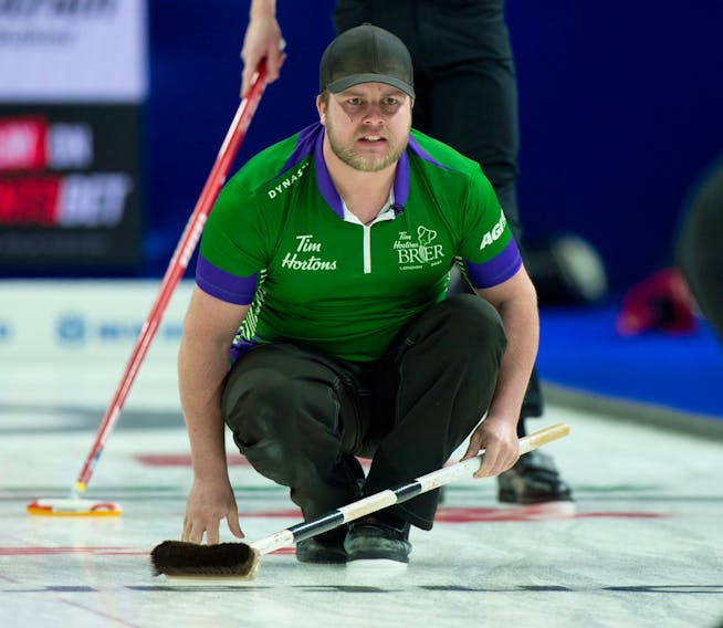 P.E.I. skip Tyler Smith intently follows a shot during a game against Team Canada’s Brad Gushue rink at the Tim Hortons Brier in London, Ont., on March 6. Gushue won the game 8-6. Michael Burns • Curling Canada